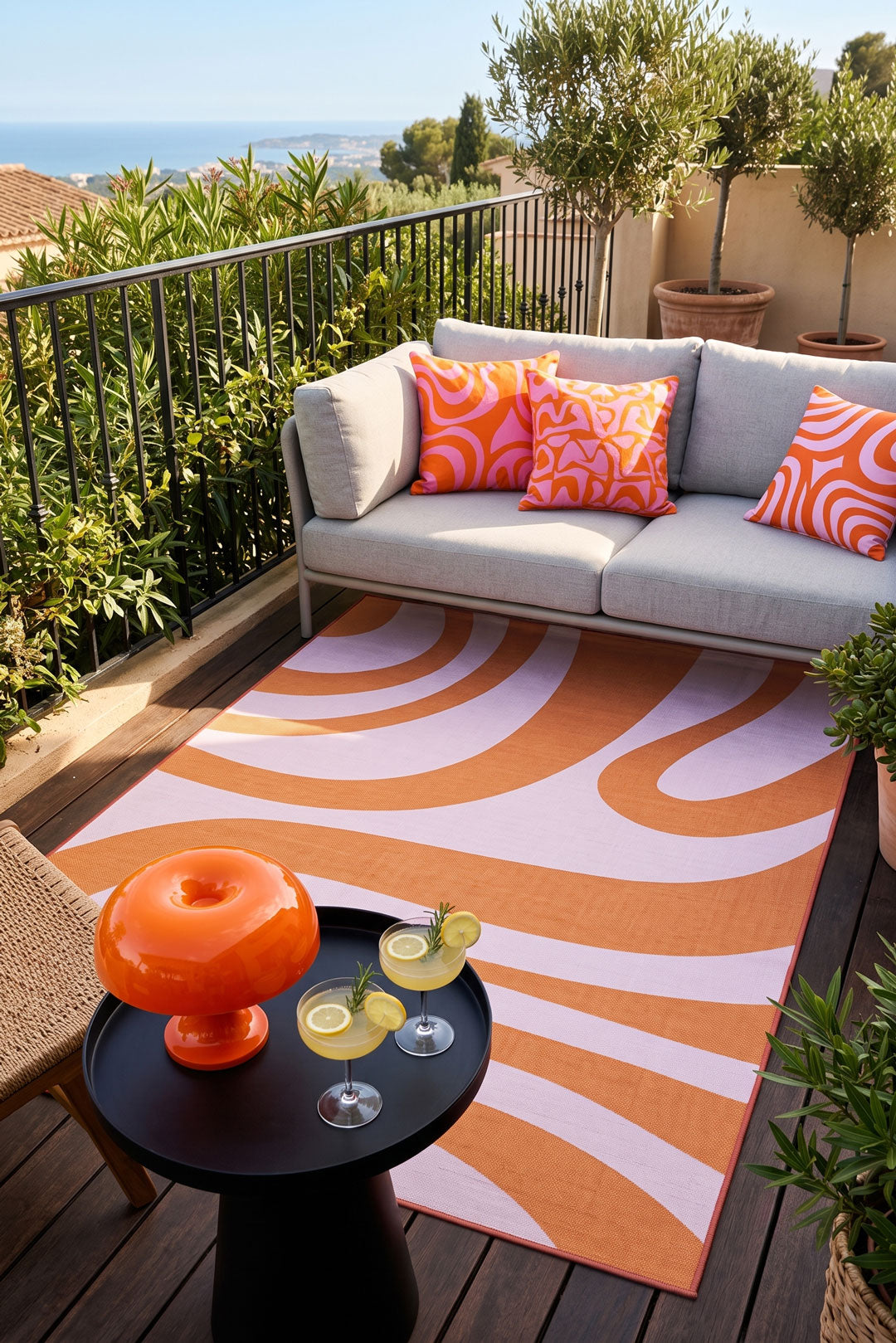 teppana-outdoor-oceane-blume-teppich-waschbarer-outdoor-teppich-rot-gelb-orange- image 5